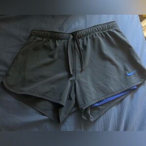 Nike Dri-Fit Grey and Blue
Size M